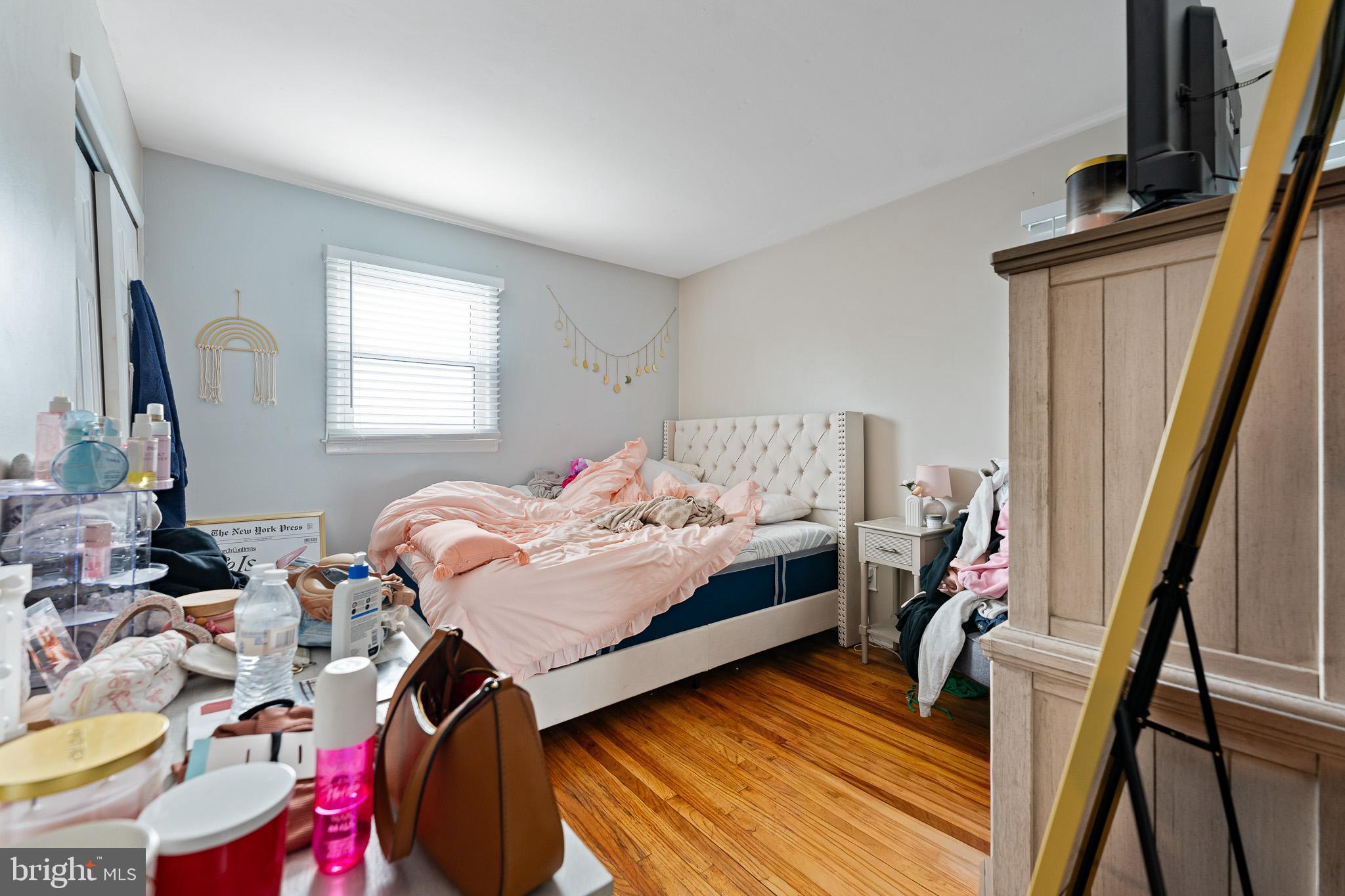 2305 Andover Road Cinnaminson, NJ 08077 - Photo 16 of 31 a bedroom with a bed and a flat tv screen on the dresser