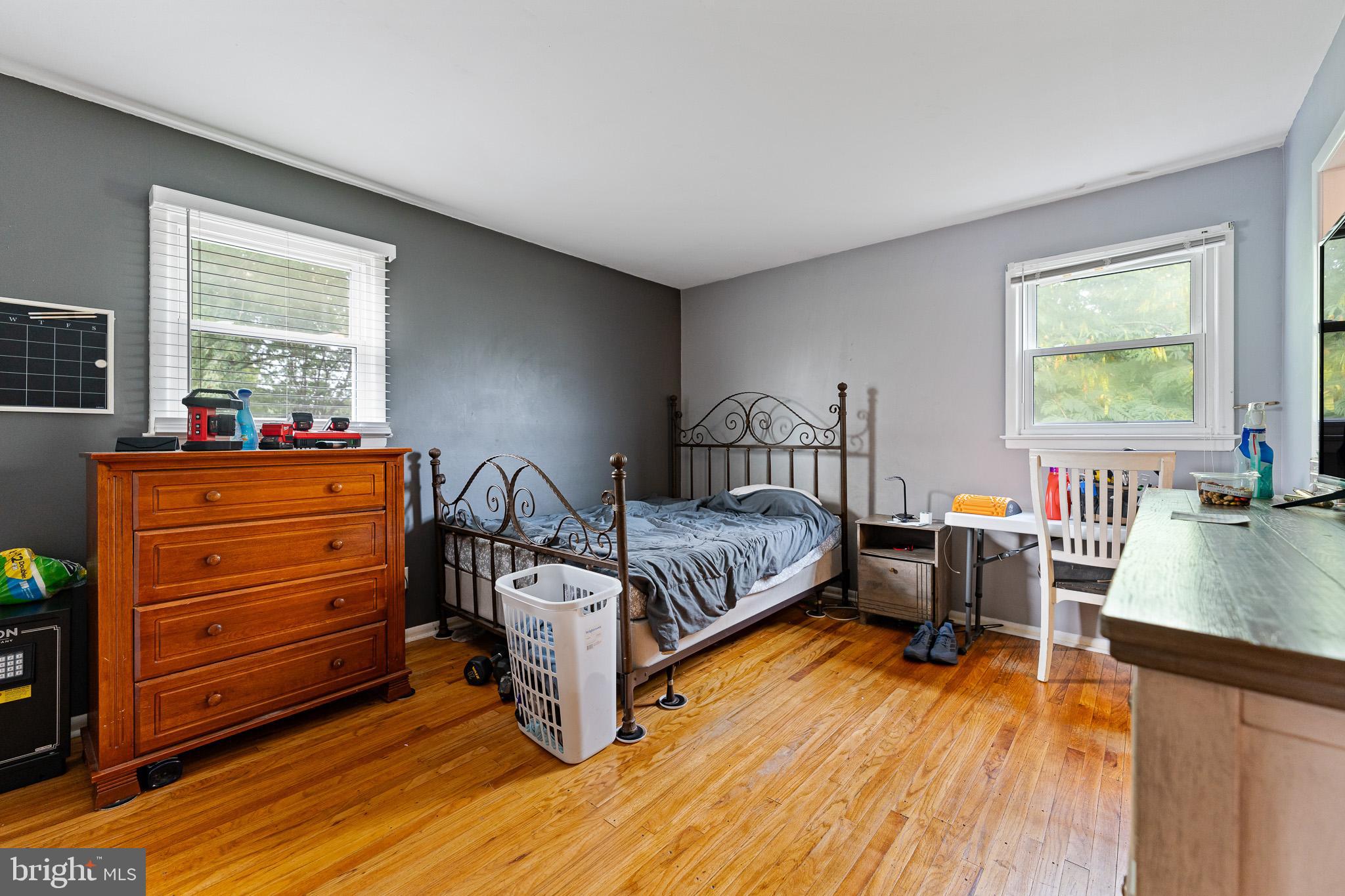 2305 Andover Road Cinnaminson, NJ 08077 - Photo 17 of 31 a bedroom with a bed and a wooden floor
