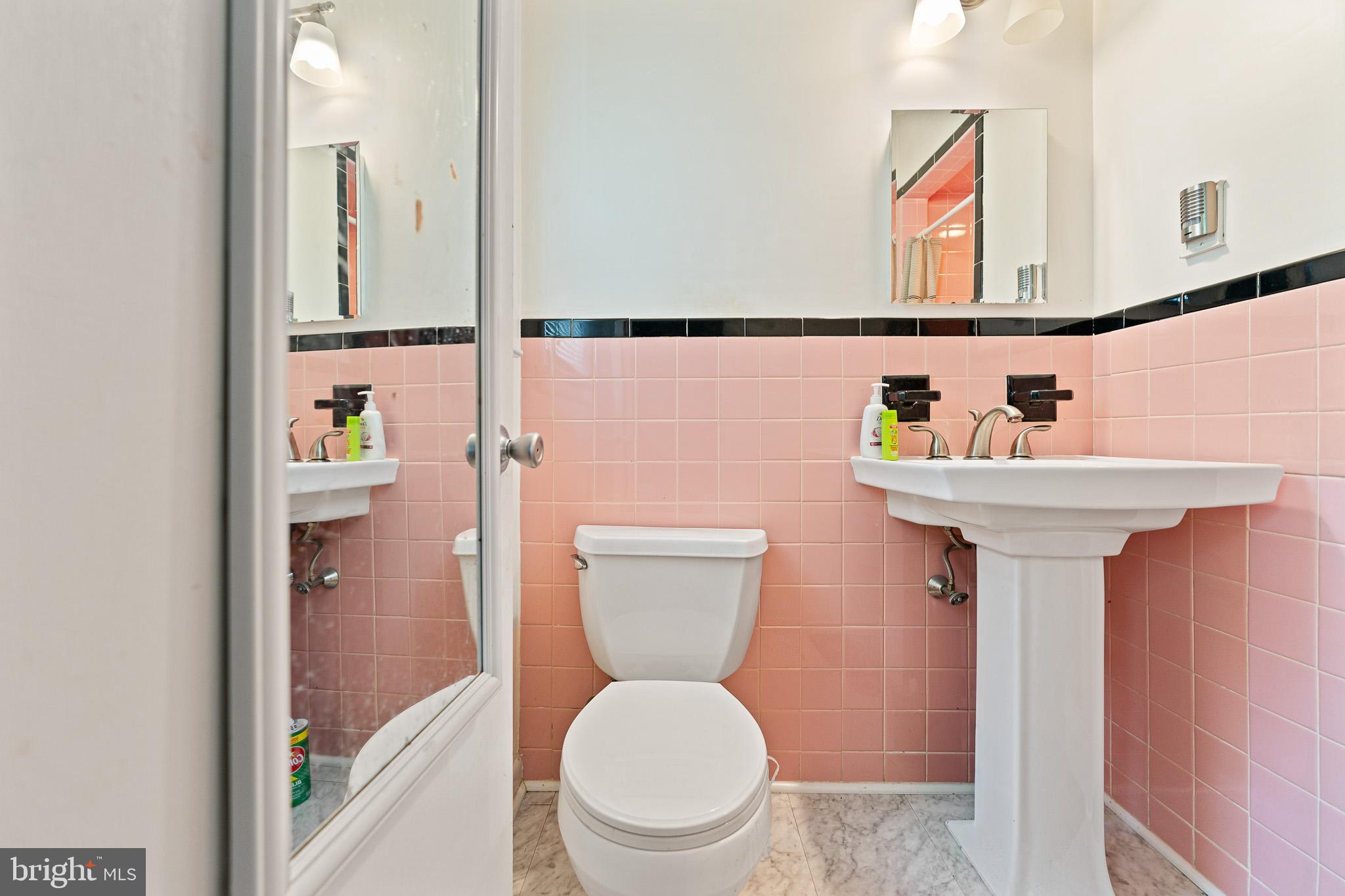 2305 Andover Road Cinnaminson, NJ 08077 - Photo 19 of 31 a bathroom with a sink mirror and toilet