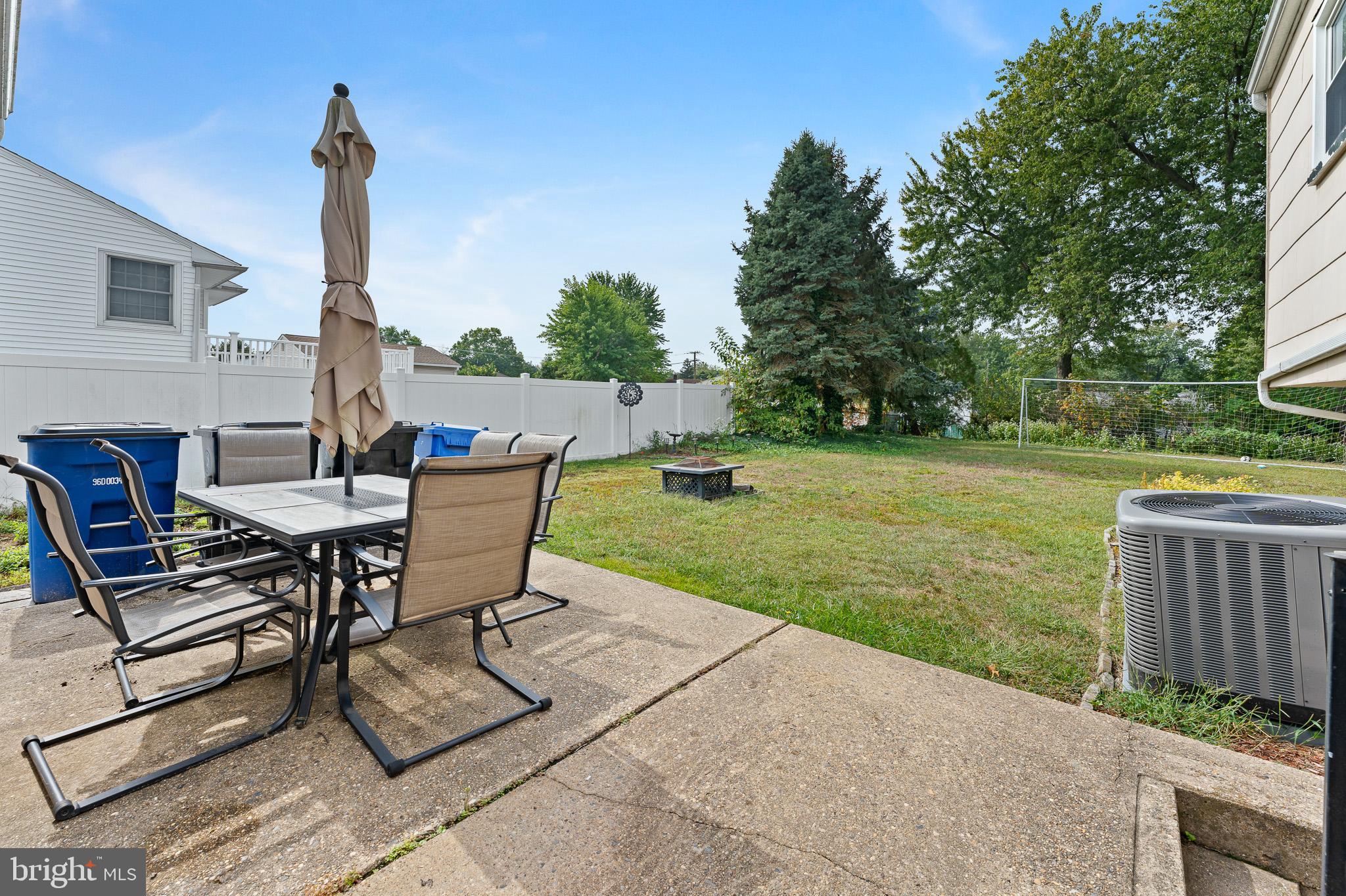 2305 Andover Road Cinnaminson, NJ 08077 - Photo 25 of 31 a view of a patio with a table and chairs