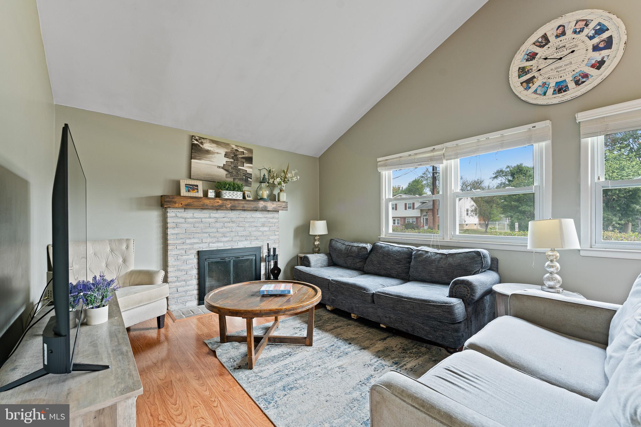 2305 Andover Road Cinnaminson, NJ 08077 - Photo 6 of 31 a living room with furniture and a fireplace