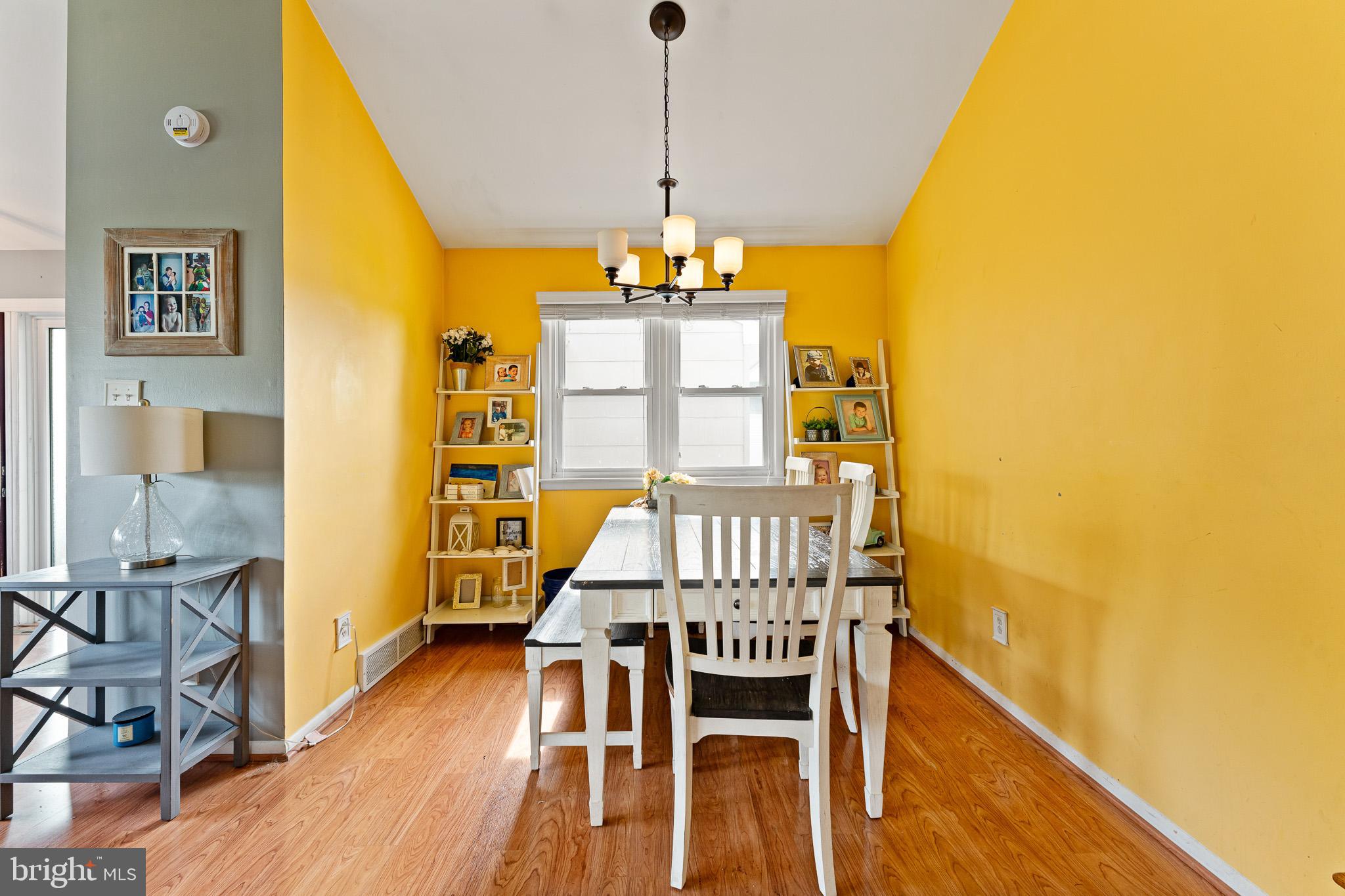 2305 Andover Road Cinnaminson, NJ 08077 - Photo 9 of 31 a view of a dining room with furniture and wooden floor