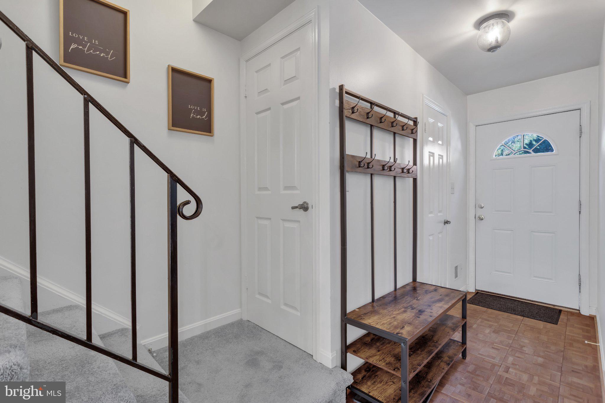 9009 Sweet Birch Court Springfield, VA 22152 - Photo 3 of 34 Inviting entryway with modern charm.