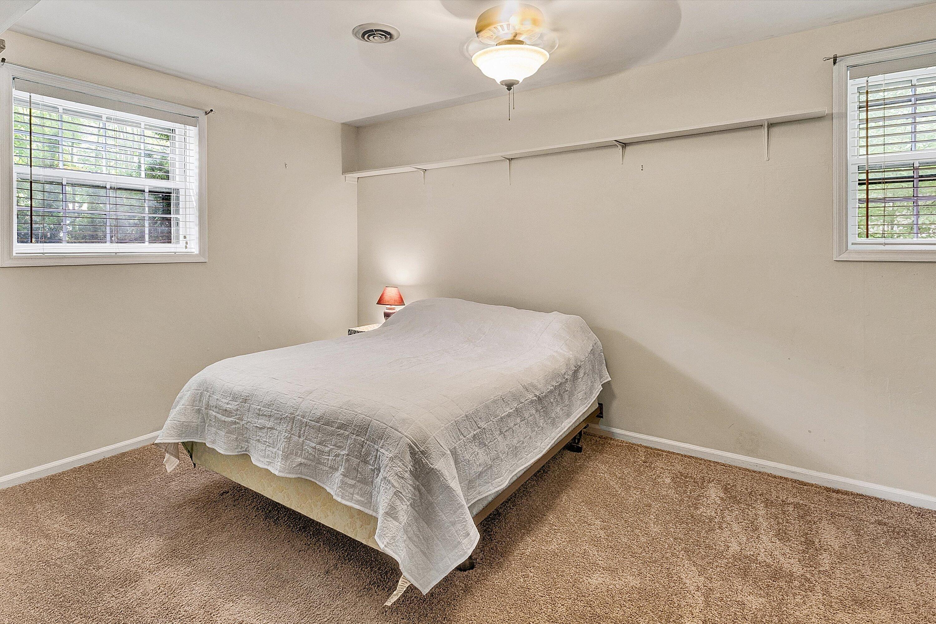 912 Cherokee Trail Covington, VA 24426 - Photo 20 of 31 a bedroom with a bed and a window