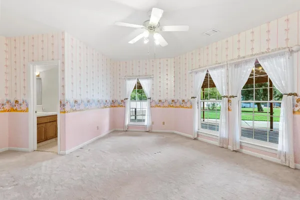 a view of gallery with windows