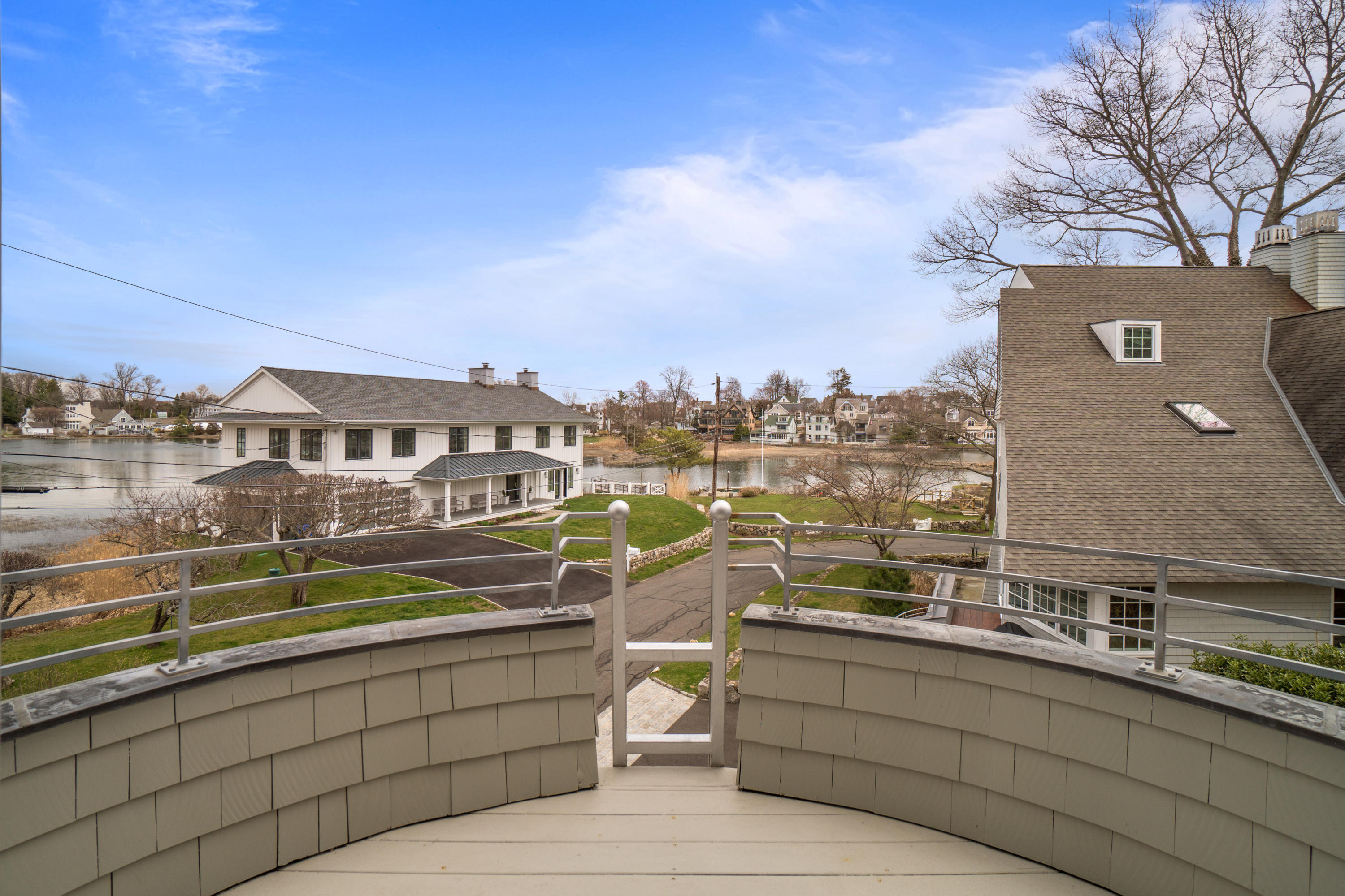 7 Nearwater Road Norwalk, CT 06853 - Photo 12 of 25 a view of a lake with a terrace
