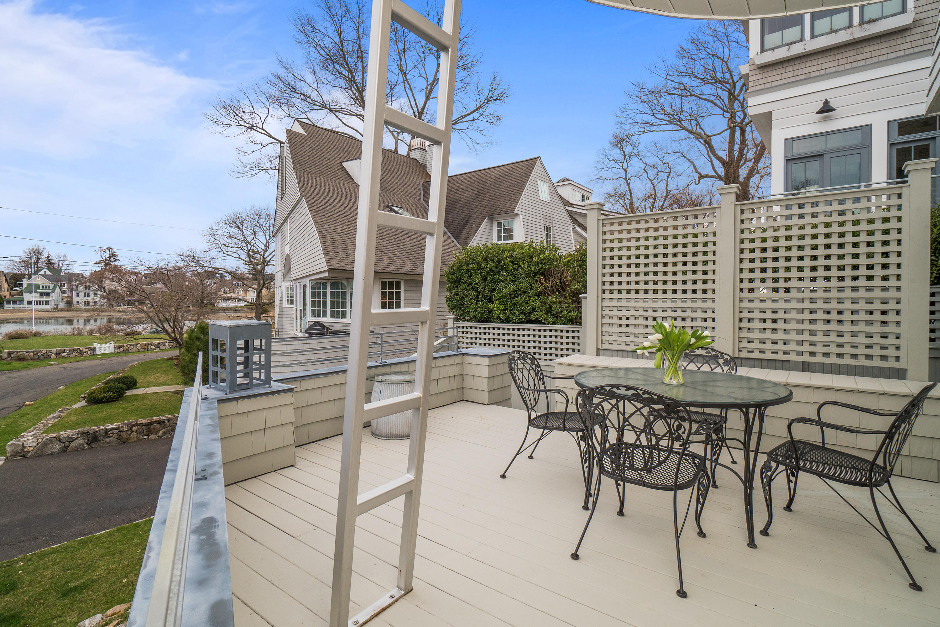 7 Nearwater Road Norwalk, CT 06853 - Photo 19 of 25 a view of a patio with table and chairs and potted plants