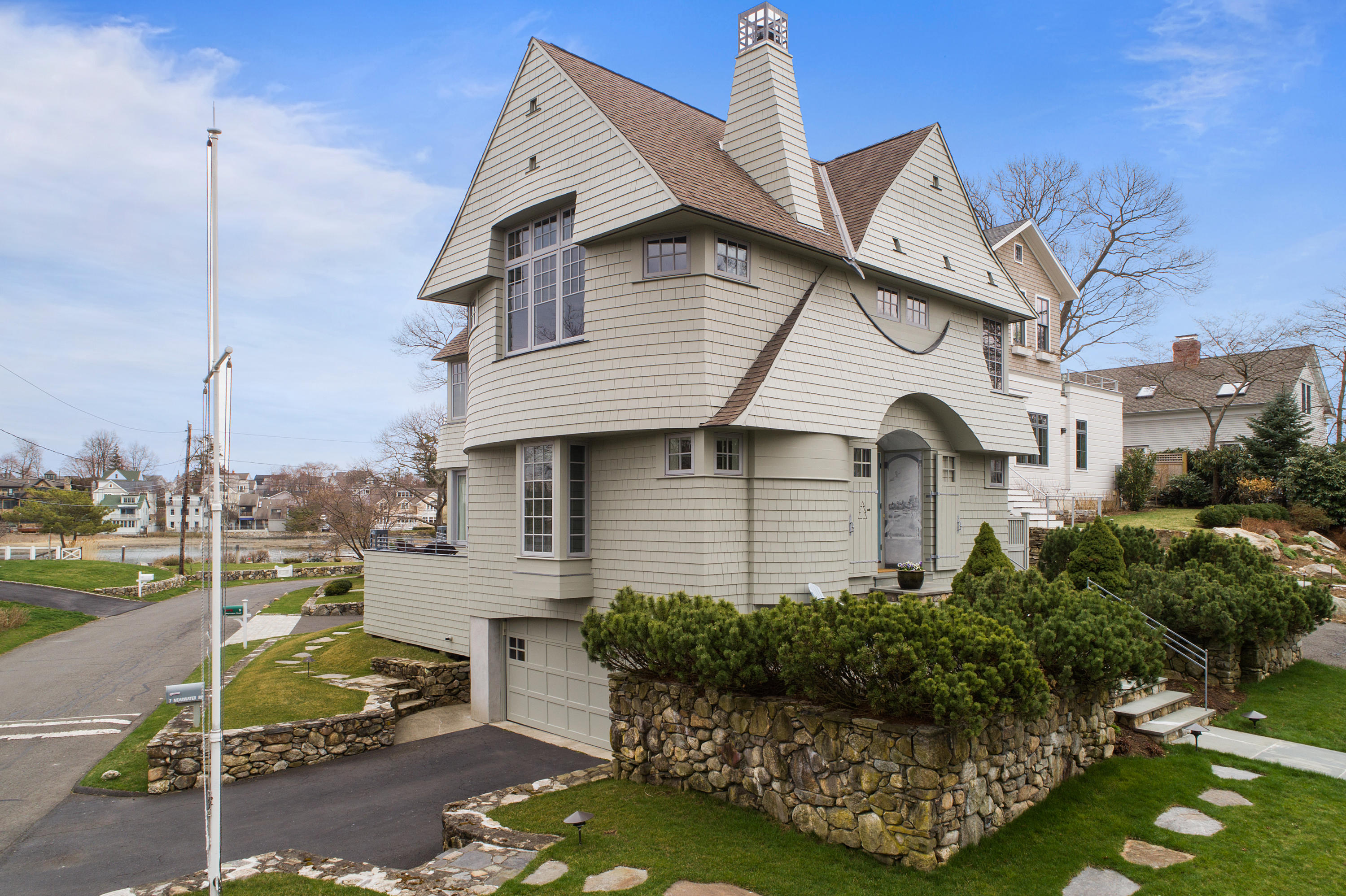 7 Nearwater Road Norwalk, CT 06853 - Photo 25 of 25 a front view of a house with a garden
