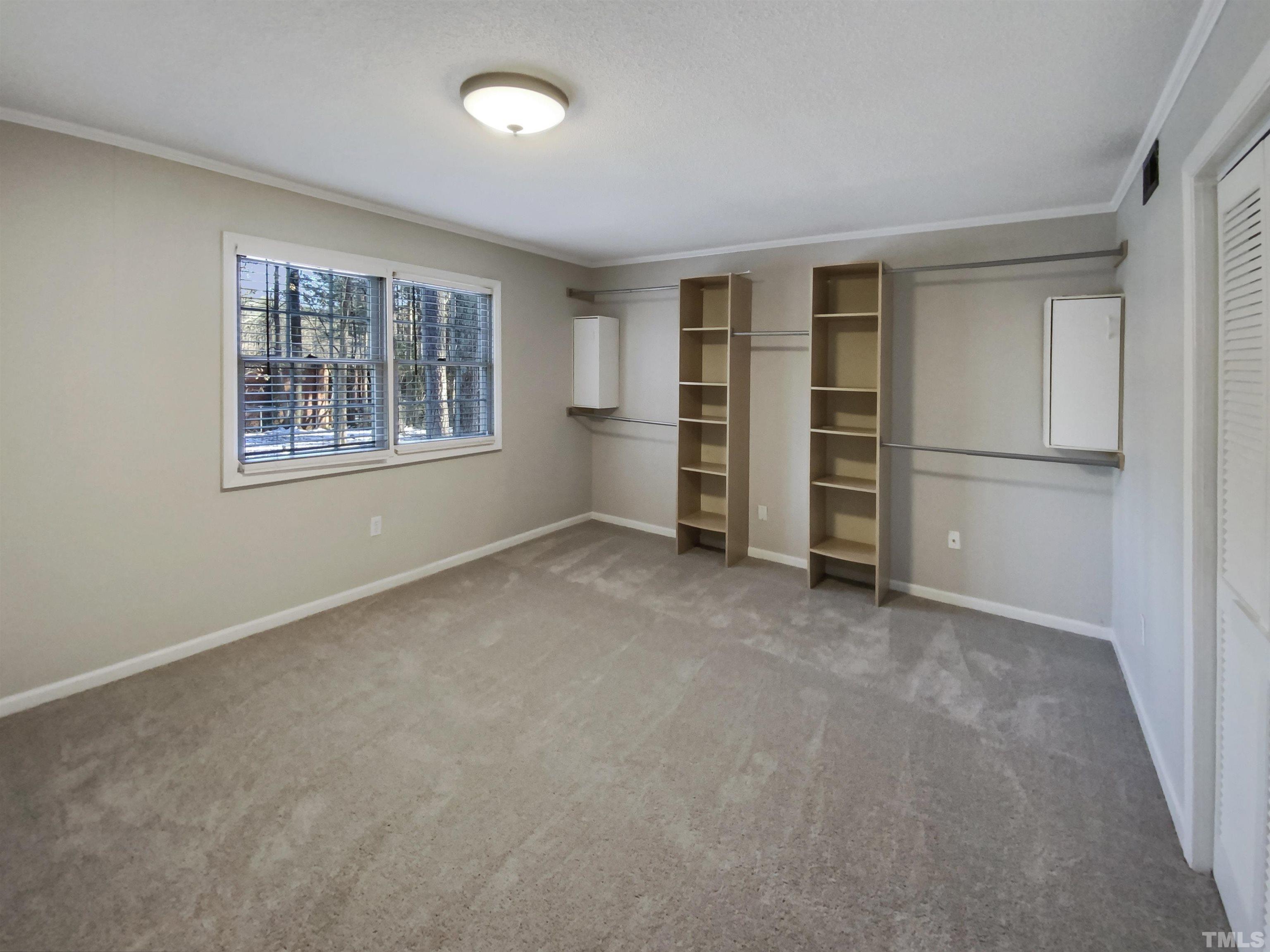 3200 Caldwell Drive Raleigh, NC 27607 - Photo 11 of 19 a view of an empty room with a closet