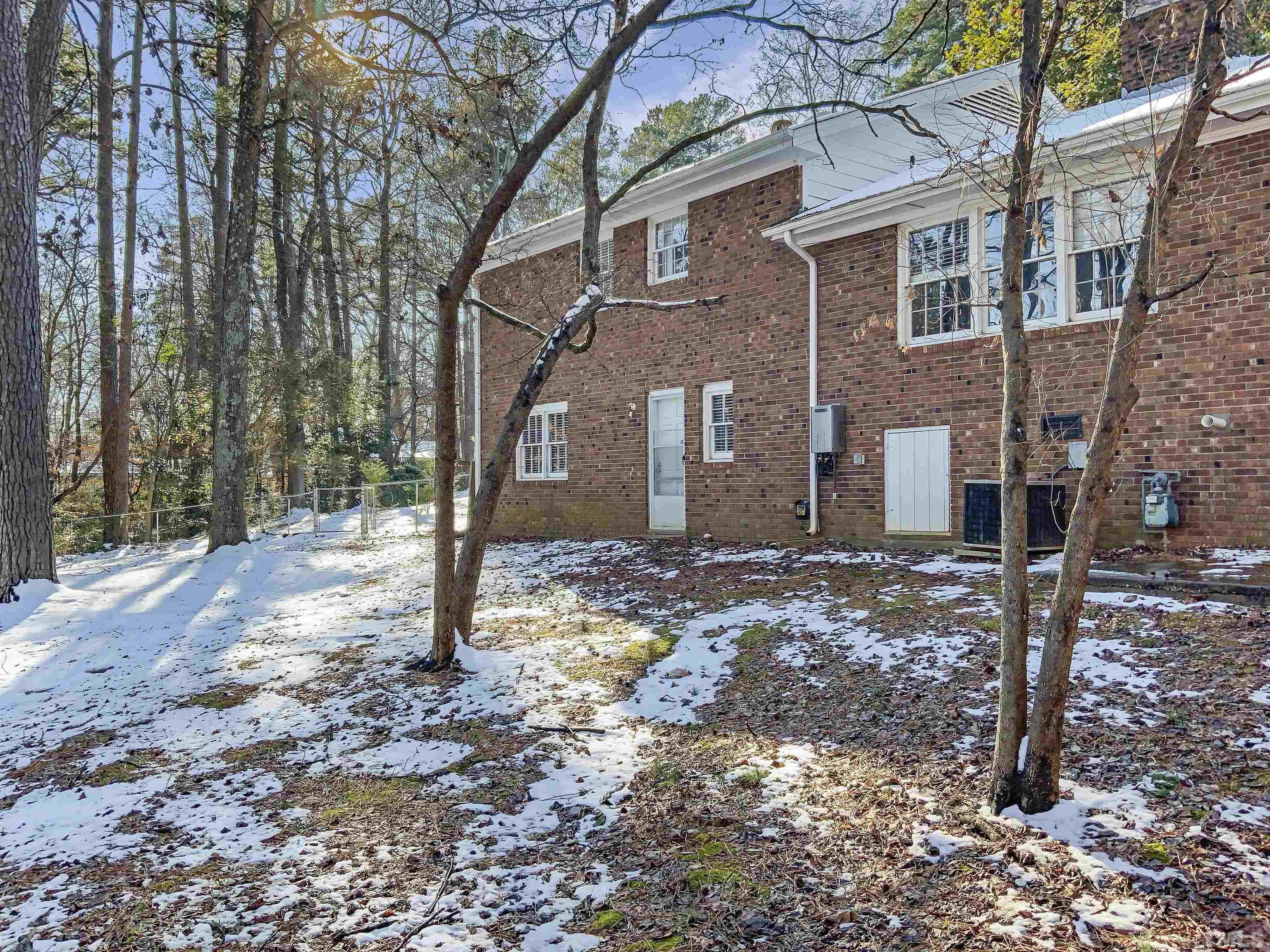 3200 Caldwell Drive Raleigh, NC 27607 - Photo 17 of 19 a view of a house with a yard