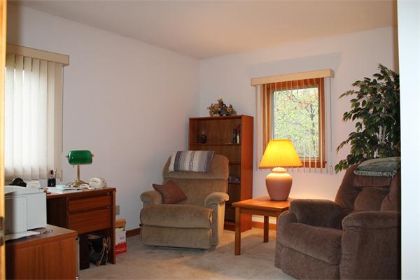 61 Stephanie Circle Springfield, MA 01129 - Photo 13 of 16 a living room with furniture a potted plant and a lamp