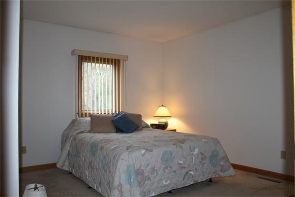 61 Stephanie Circle Springfield, MA 01129 - Photo 14 of 16 a bedroom with a bed and a window