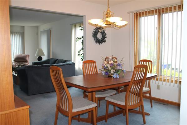 61 Stephanie Circle Springfield, MA 01129 - Photo 3 of 16 a view of a dining room with furniture and chandelier