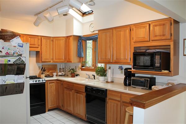 61 Stephanie Circle Springfield, MA 01129 - Photo 4 of 16 a kitchen with a sink cabinets and appliances
