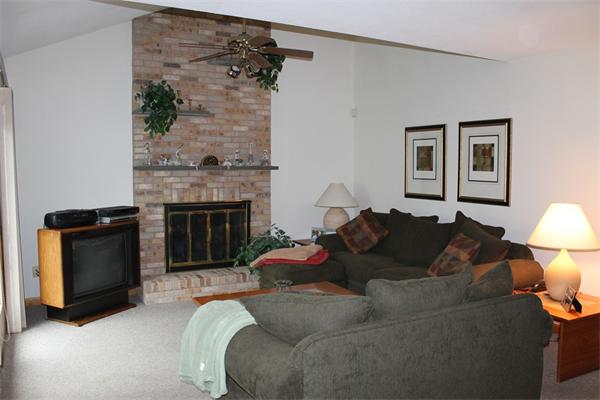 61 Stephanie Circle Springfield, MA 01129 - Photo 6 of 16 a living room with furniture and a fireplace