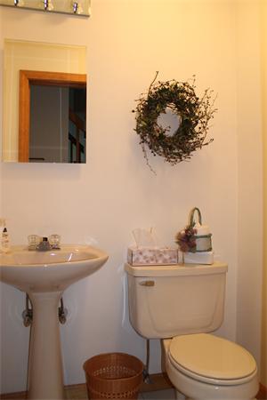 61 Stephanie Circle Springfield, MA 01129 - Photo 8 of 16 a bathroom with a toilet a sink and mirror