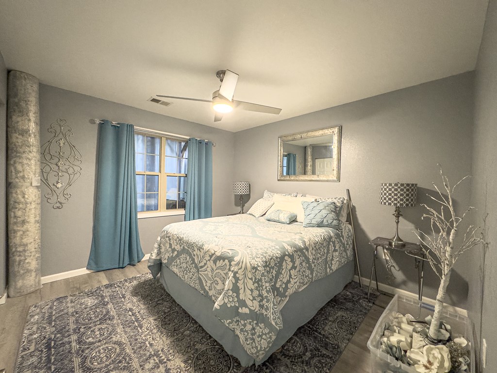 89 Box Turtle Lane Murphy, NC 28906 - Photo 41 of 55 a bedroom with a large bed and a window