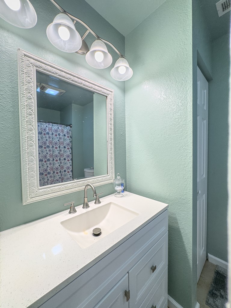 89 Box Turtle Lane Murphy, NC 28906 - Photo 44 of 55 a bathroom with a sink and a mirror