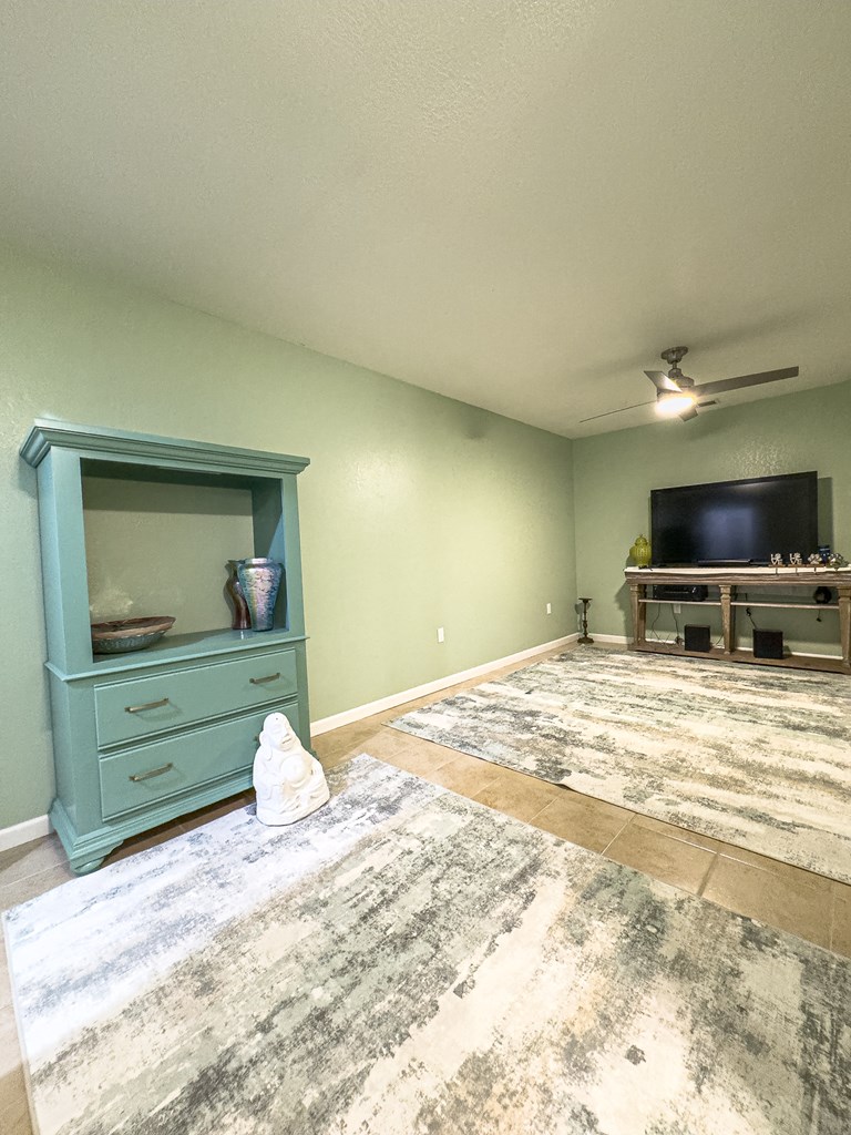 89 Box Turtle Lane Murphy, NC 28906 - Photo 46 of 55 a bedroom with a bed and a flat screen tv