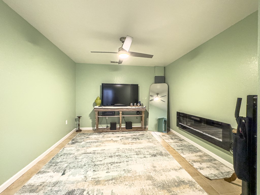 89 Box Turtle Lane Murphy, NC 28906 - Photo 48 of 55 a bedroom with a bed and a flat screen tv