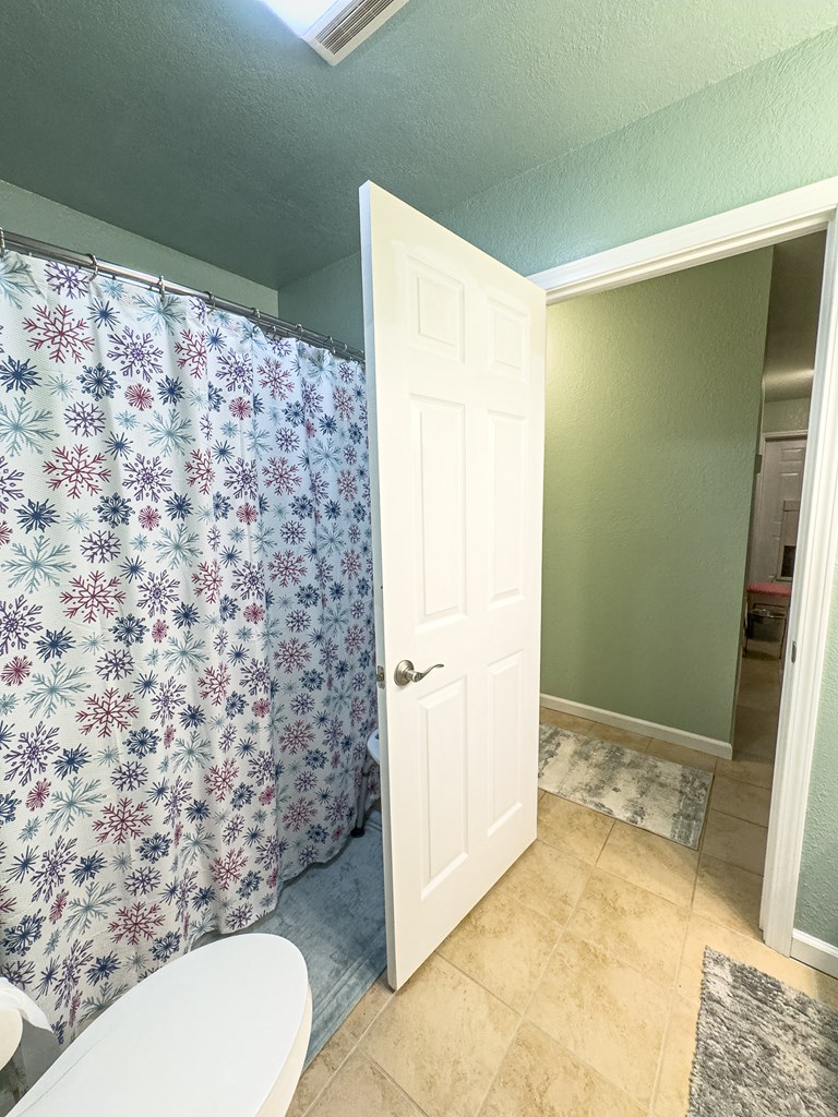 89 Box Turtle Lane Murphy, NC 28906 - Photo 49 of 55 a bathroom with a toilet and a shower