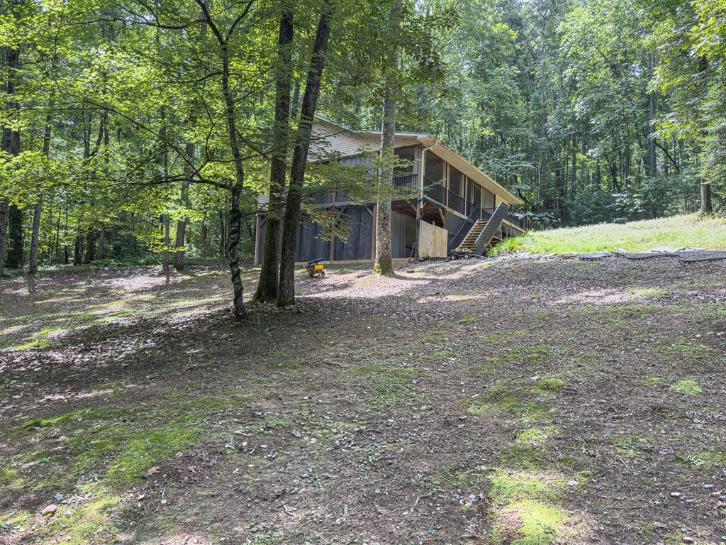 89 Box Turtle Lane Murphy, NC 28906 - Photo 52 of 55 a view of a house with backyard and trees