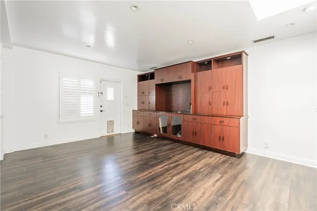 a view of a backyard of the house