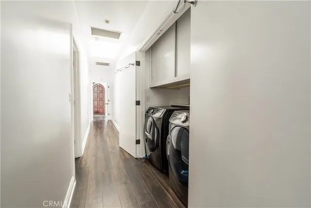 a view of a house with a backyard and stairs