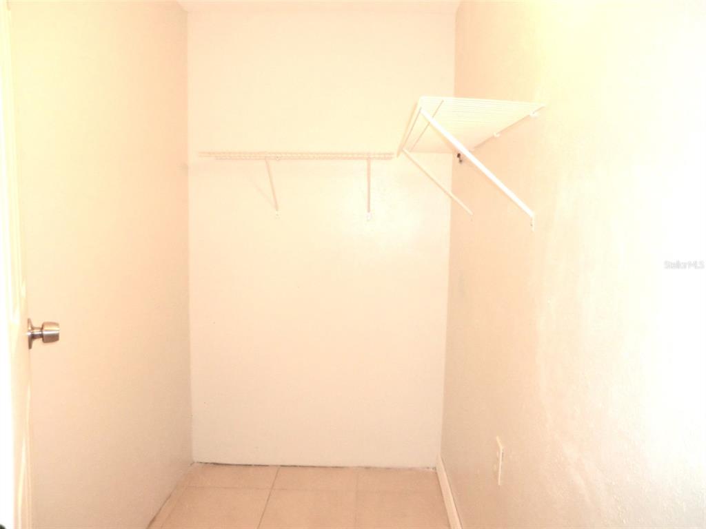 102 Cambridge Trail, Unit 229 Sun City Center, FL 33573 - Photo 12 of 18 a bathroom with a shower