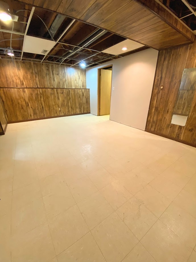 620 Sycamore Road Buffalo Grove, IL 60089 - Photo 20 of 21 a view of a room with wooden walls
