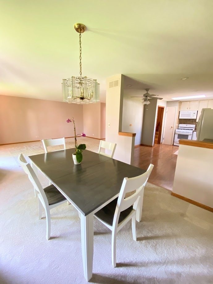 620 Sycamore Road Buffalo Grove, IL 60089 - Photo 3 of 21 a dining room with furniture and window
