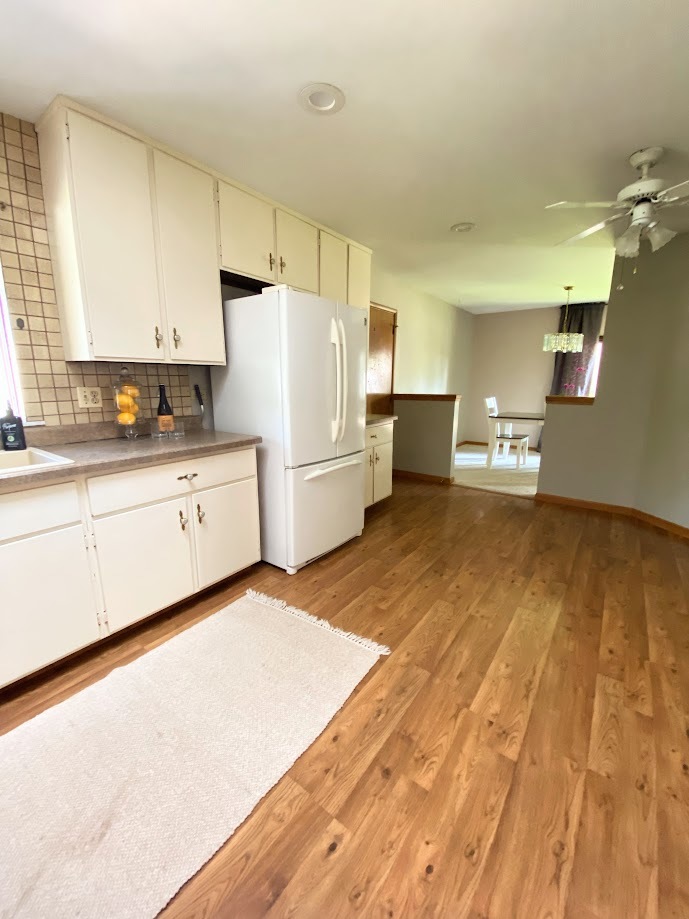 620 Sycamore Road Buffalo Grove, IL 60089 - Photo 5 of 21 a kitchen with stainless steel appliances a refrigerator and a stove top oven