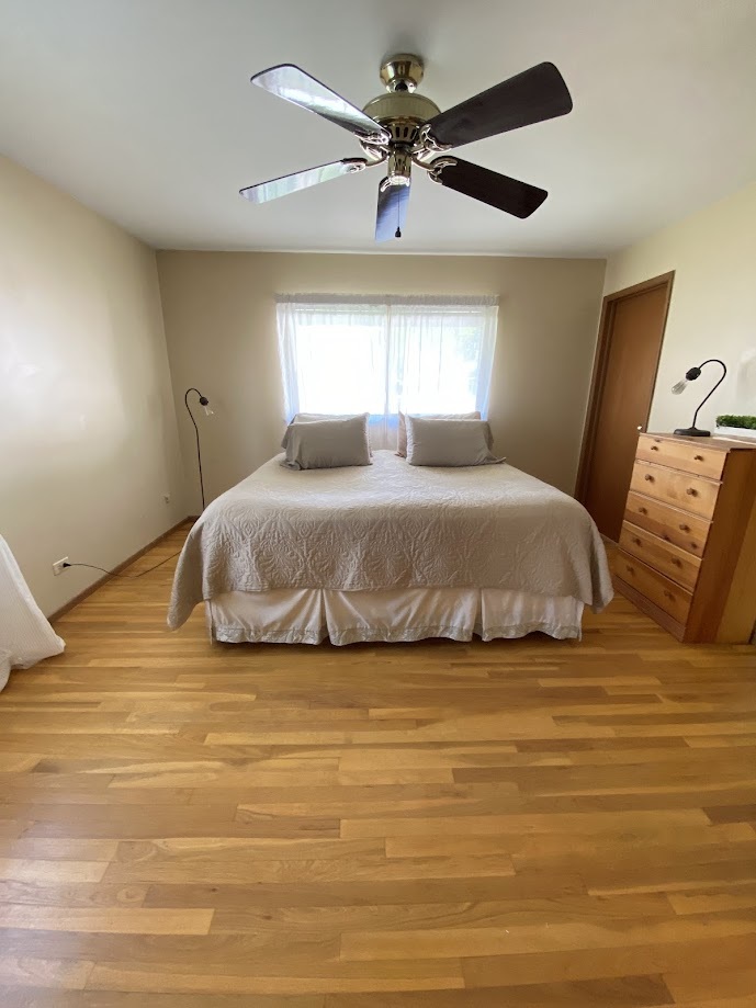 620 Sycamore Road Buffalo Grove, IL 60089 - Photo 7 of 21 a bedroom with a bed and a window