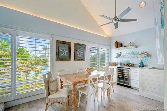 a workspace with furniture window and wooden floor