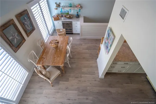 a view of a balcony with chairs