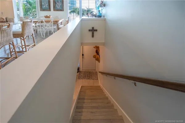 a view of a balcony with furniture