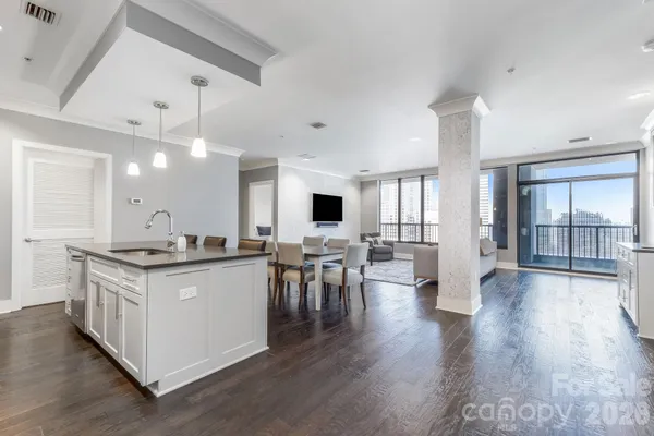 a kitchen with stainless steel appliances stove top oven and cabinets