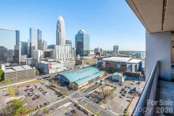 a picture of a city view with lawn chairs