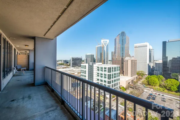a view of balcony with furniture