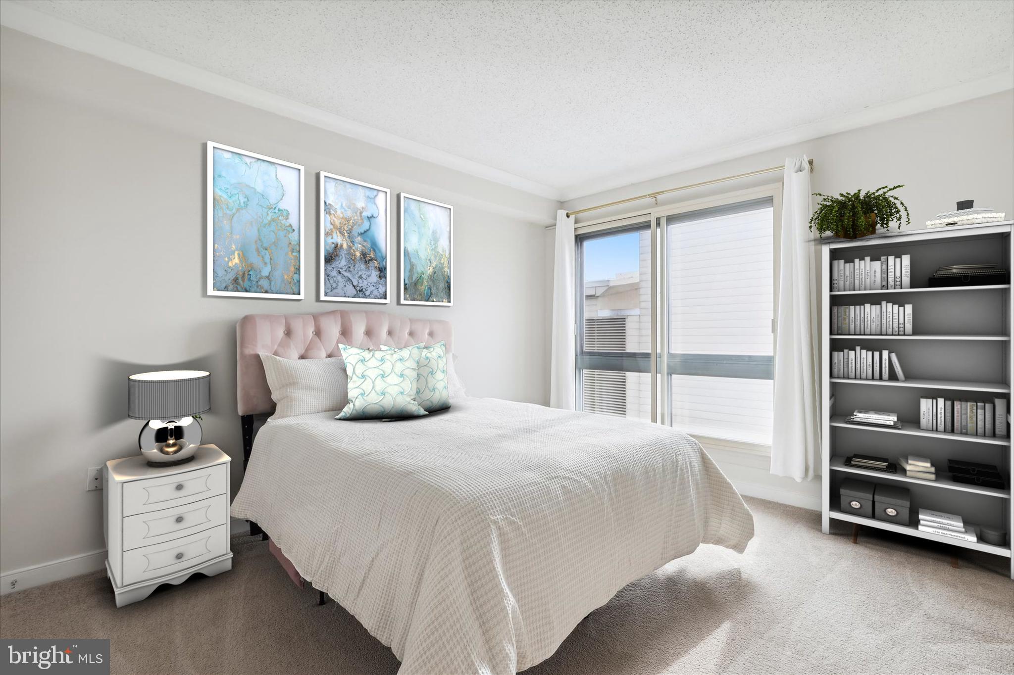 777 7th Street Northwest, Unit 804 Washington, DC 20001 - Photo 20 of 58 a bedroom with a bed and a large window