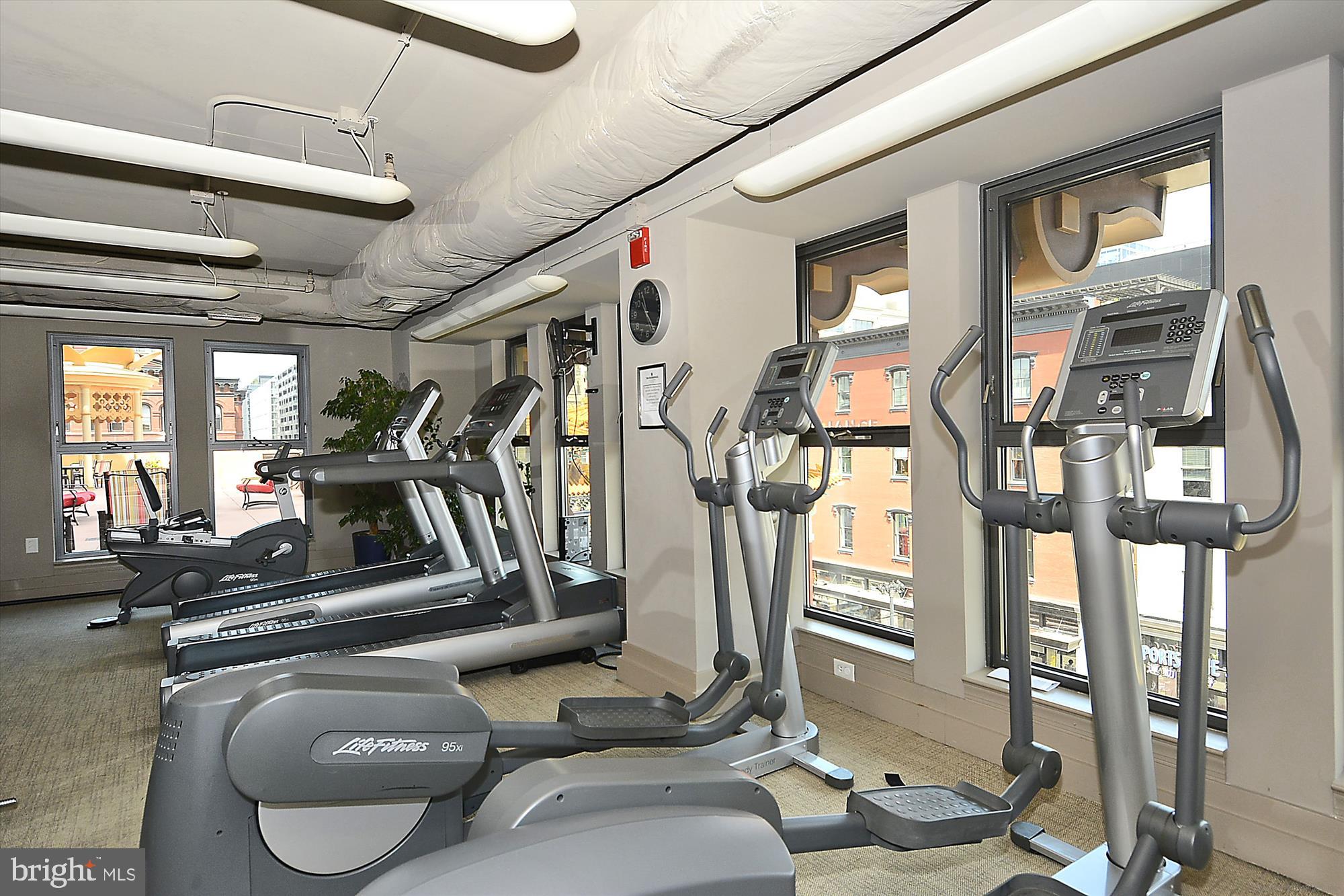 777 7th Street Northwest, Unit 804 Washington, DC 20001 - Photo 36 of 58 a room with gym equipment
