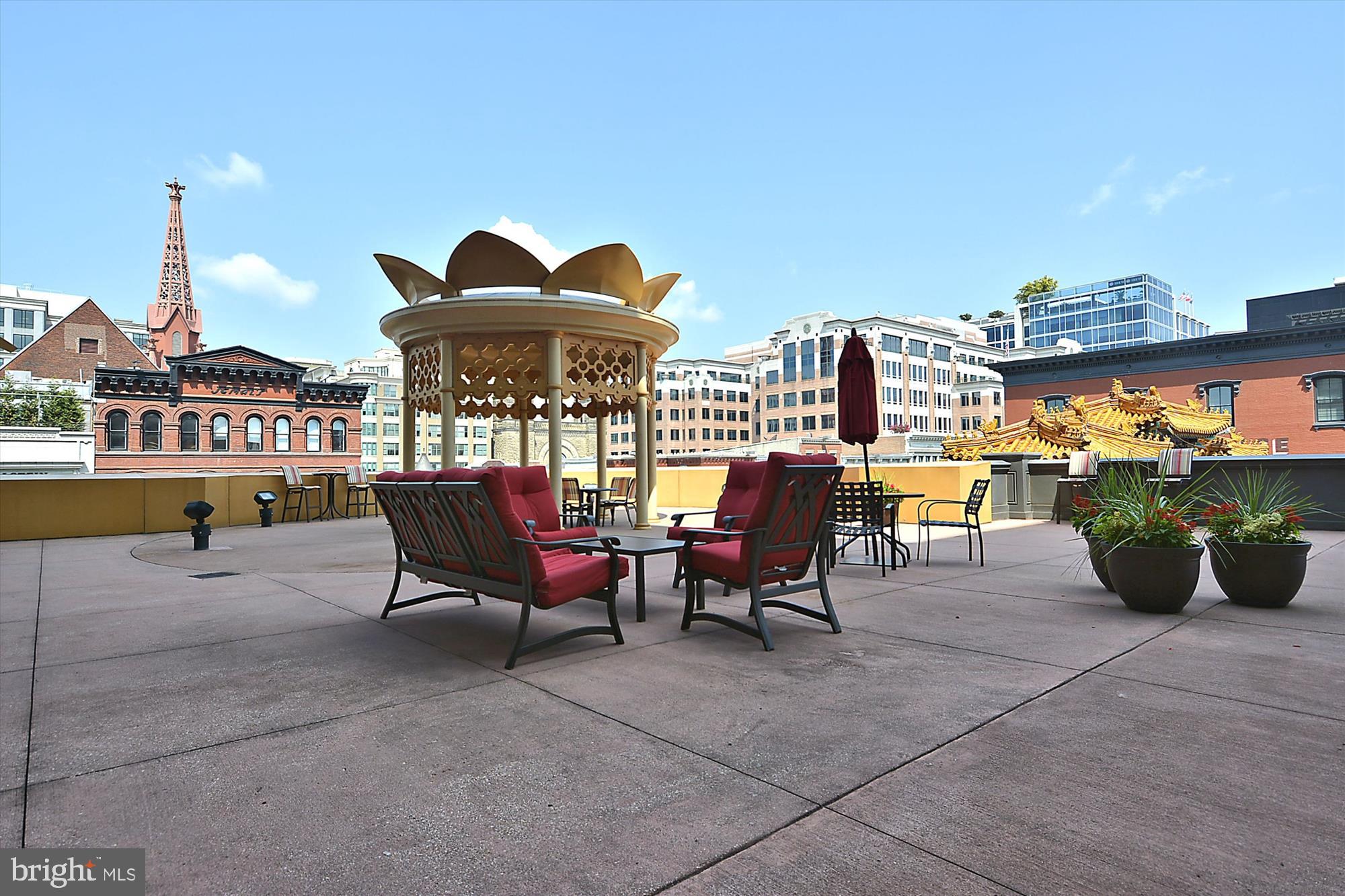 777 7th Street Northwest, Unit 804 Washington, DC 20001 - Photo 40 of 58 a view of a terrace with sitting area