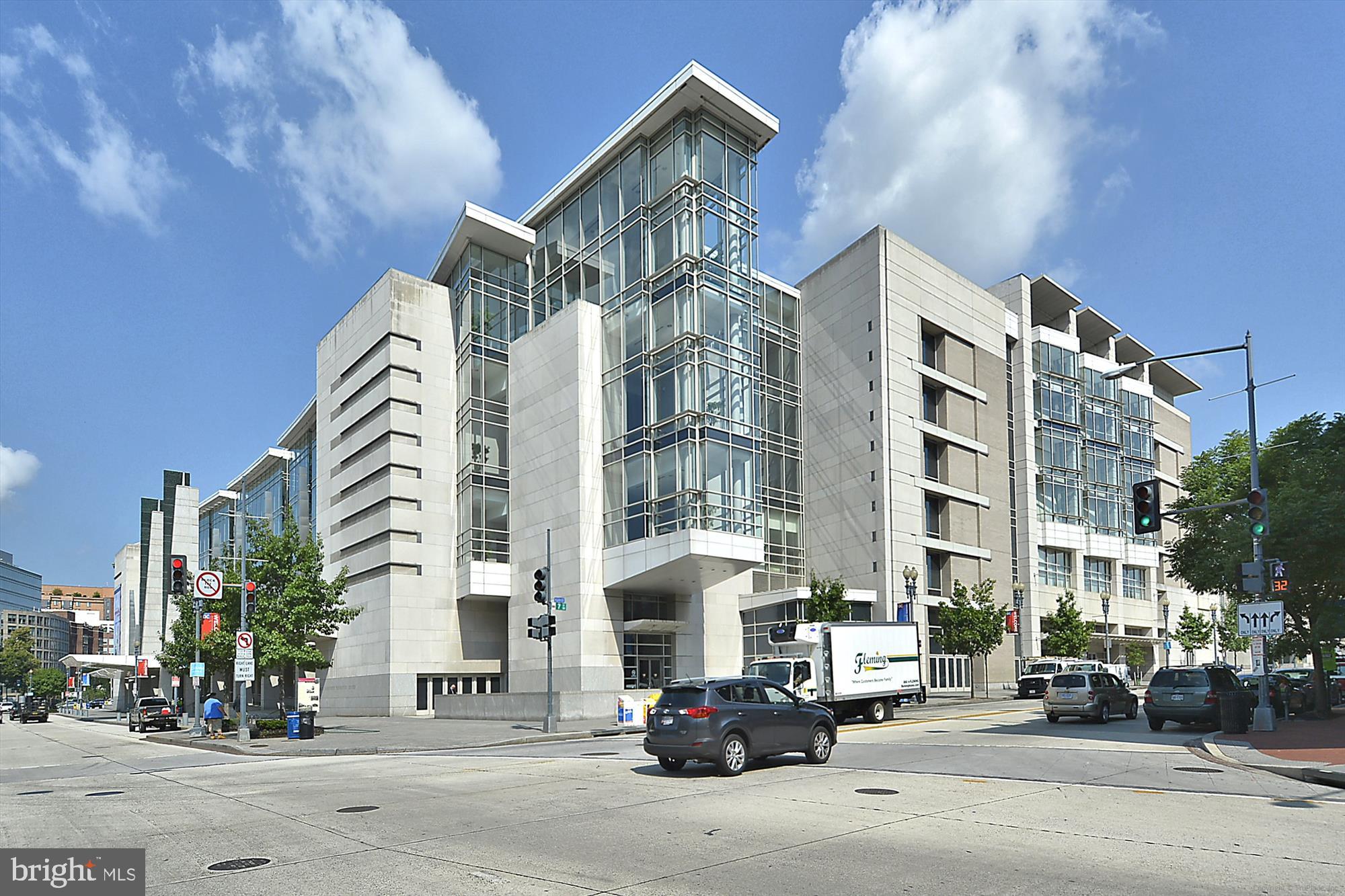 777 7th Street Northwest, Unit 804 Washington, DC 20001 - Photo 57 of 58 a city street lined with buildings and cars