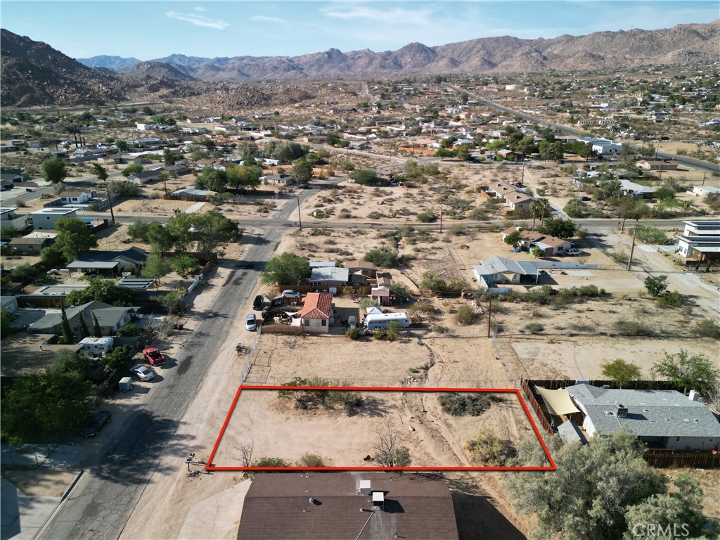 61998 El Reposo Circle Joshua Tree, CA 92252 - Photo 15 of 20 an aerial view of residential house with parking space