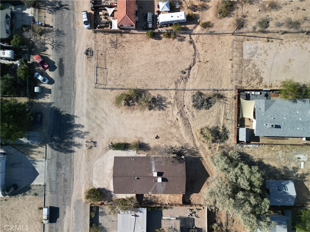 61998 El Reposo Circle Joshua Tree, CA 92252 - Photo 16 of 20 an aerial view of residential houses with outdoor space