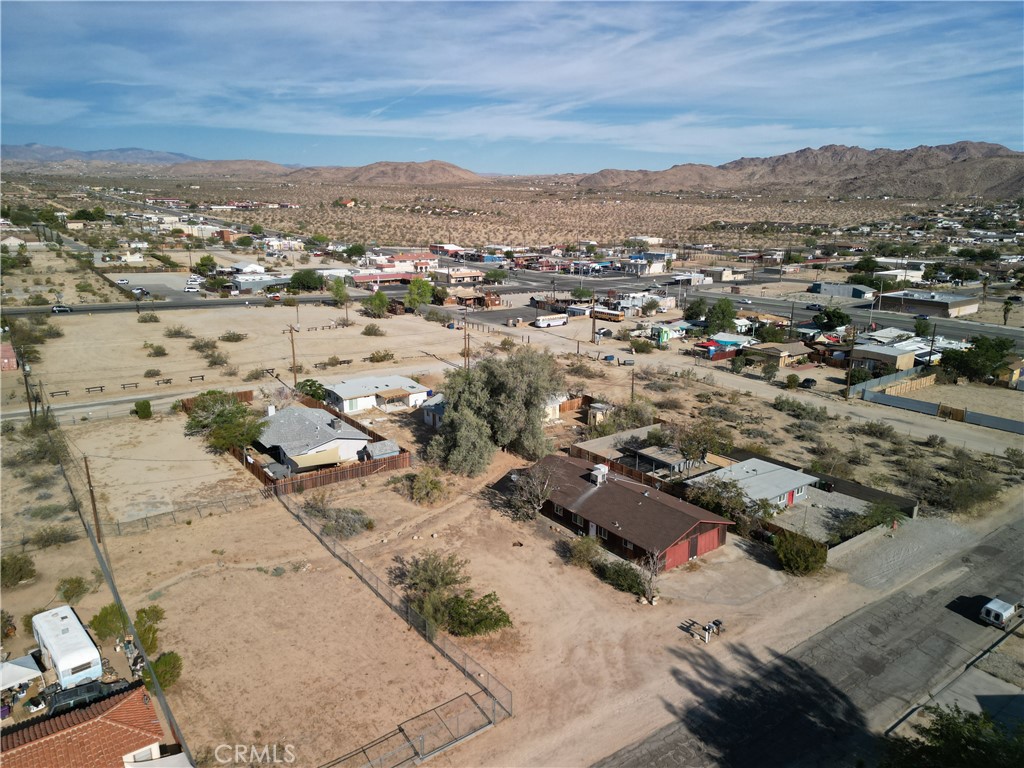 61998 El Reposo Circle Joshua Tree, CA 92252 - Photo 5 of 20 an aerial view of residential house and ocean view