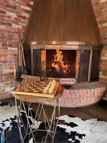 a view of a table and chairs in the patio