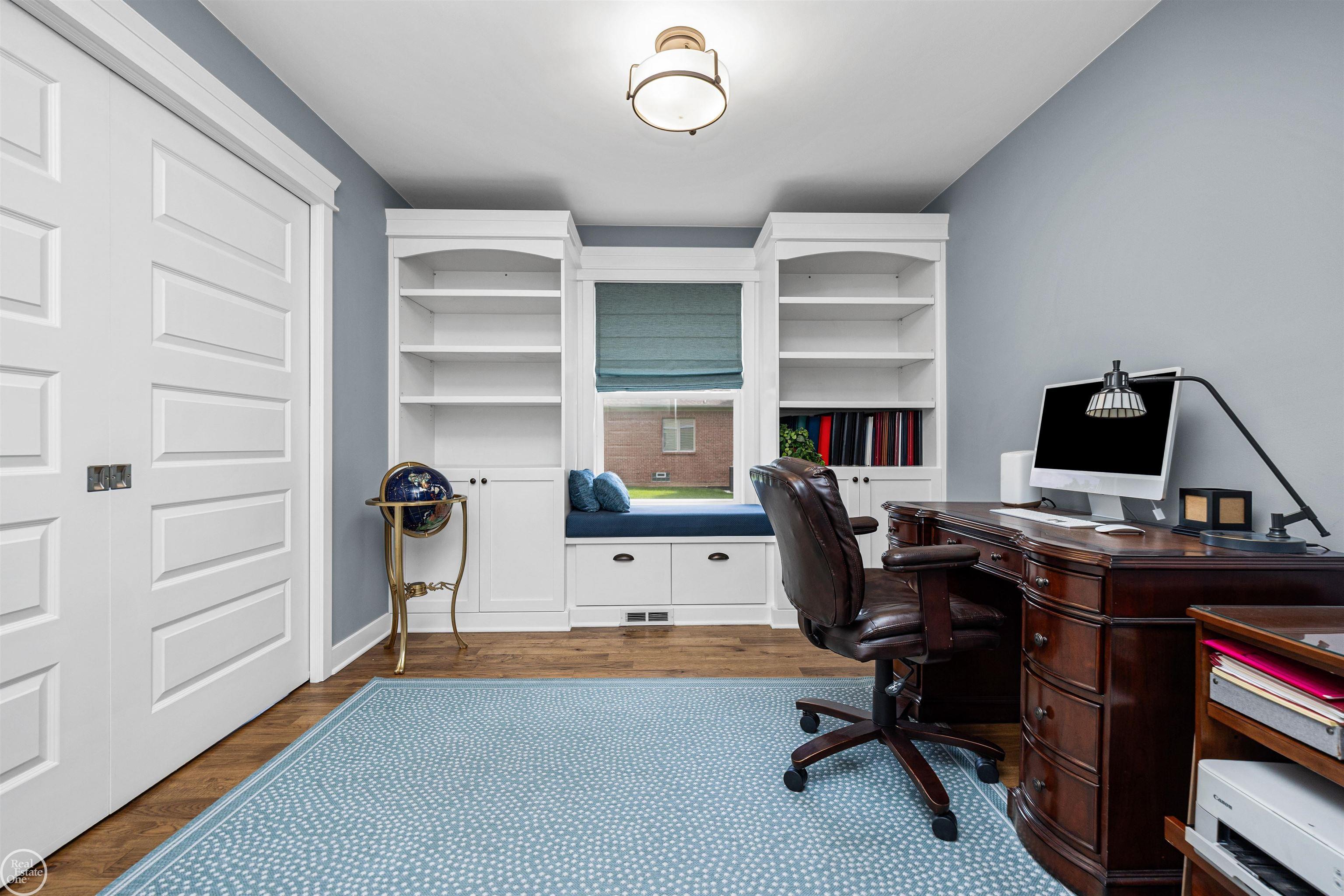 64110 Campground Road Washington, MI 48095 - Photo 31 of 74 Perfect home office space or den with built-in bookcases and window bench