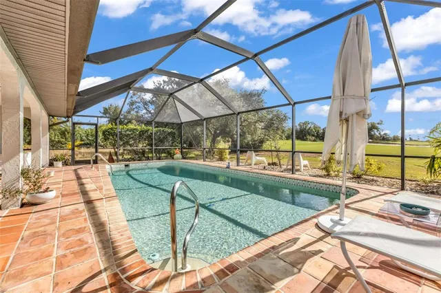 $549,000 | 11903 Southwest Kingsway Circle, Lake Suzy, FL 34269