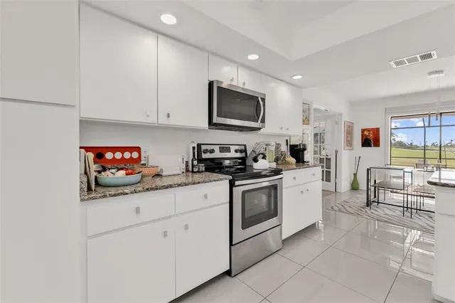 $549,000 | 11903 Southwest Kingsway Circle, Lake Suzy, FL 34269